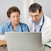 Doctors with laptop