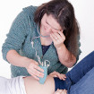 Woman listening to stomach