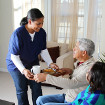 Carer bringing tea