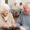 Couple playing dominos