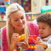 Woman playing with child