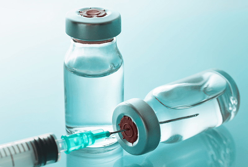 Syringe and vials