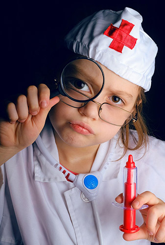 Young girl dressed up as medic
