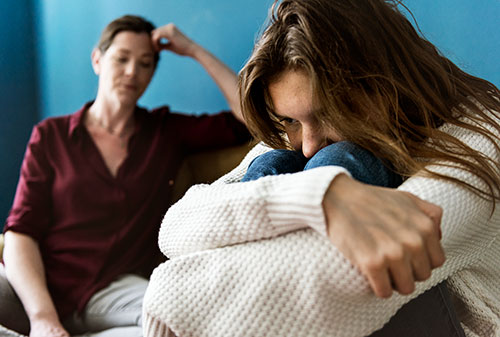 Mother and teenager daughter arguing