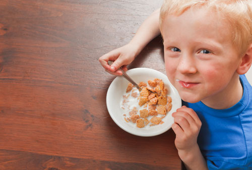Boy eating breakfast