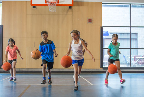 Children playing basketball