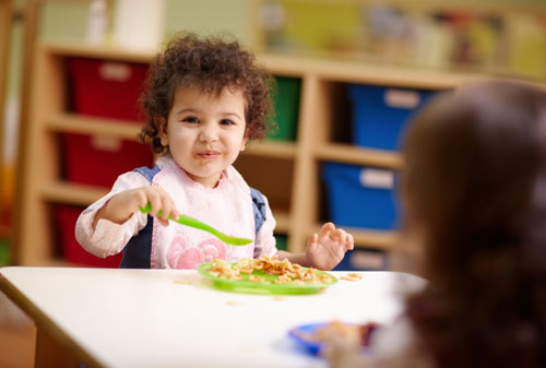 Toddler eating food