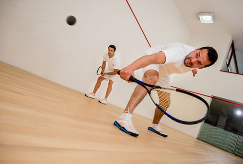 Men playing squash
