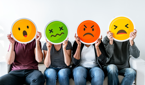 People holding emoticons