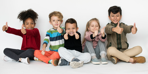 Children with their thumbs up