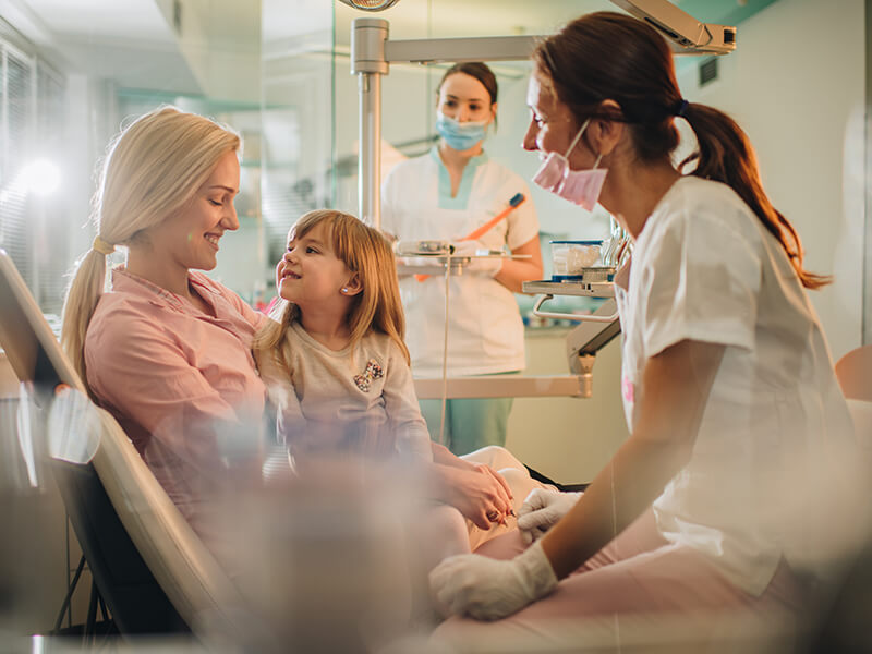 Dentist with child