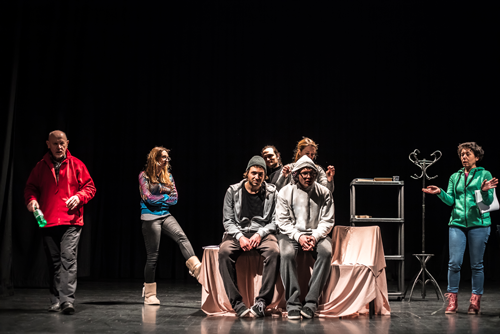 Actors rehearsing on stage