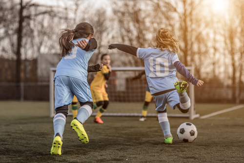 Children playing football