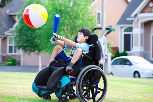 Disabled child playing in the park