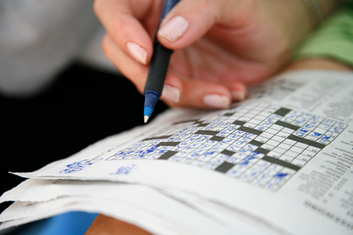 Doing a crossword puzzle