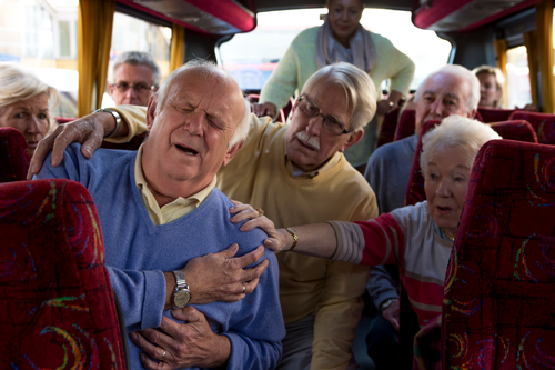 Elderly man having a heart attack