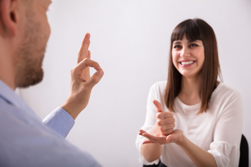 People speaking in sign language