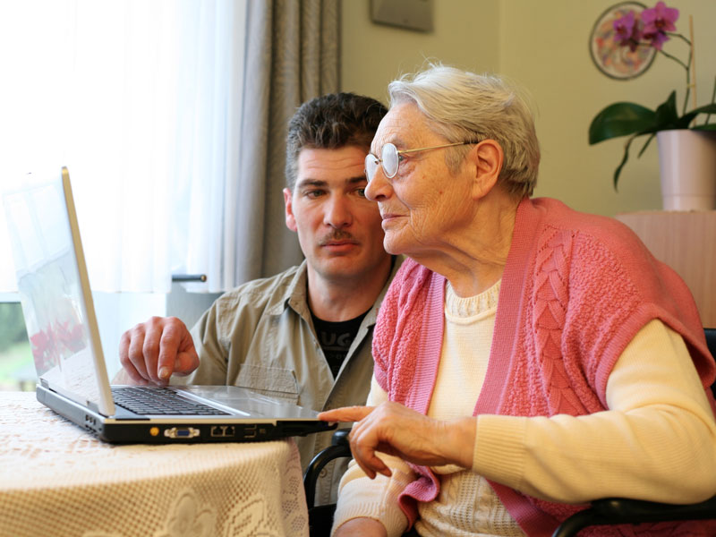 Elderly woman on laptop