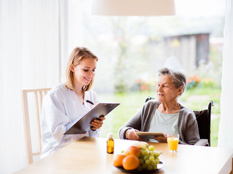 Health visitor and patient