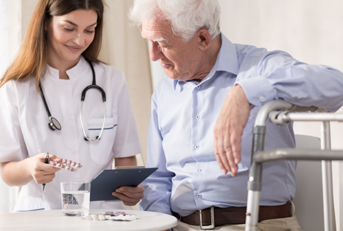 Elderly man and nurse