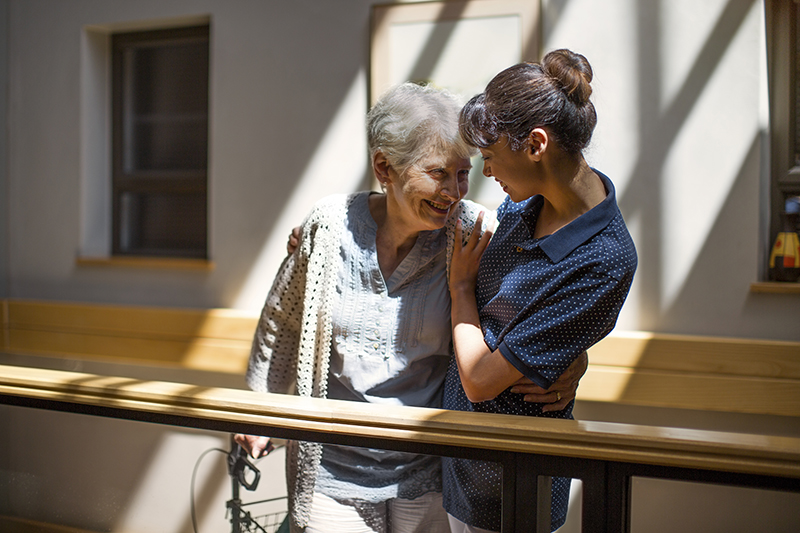 Elderly woman and nurse