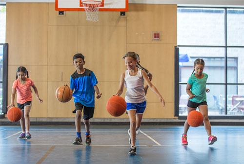 Children playing basketball