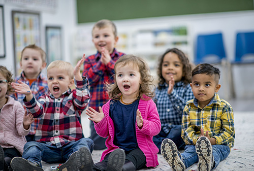 Children clapping to a song