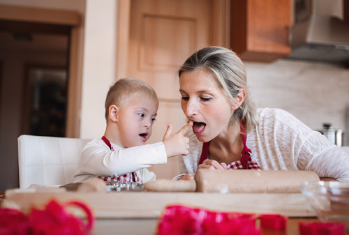 Mother and child baking
