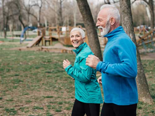 Elderly couple exercising