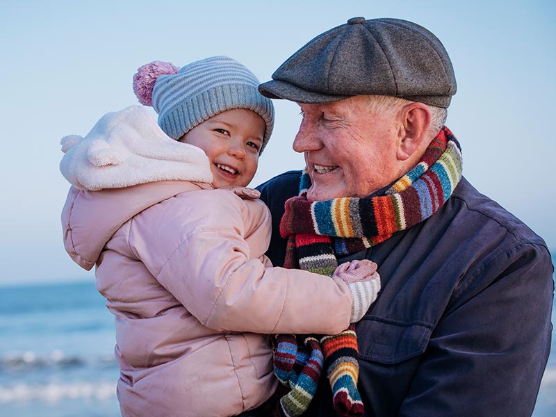 A grandfather with his young granddaughter
