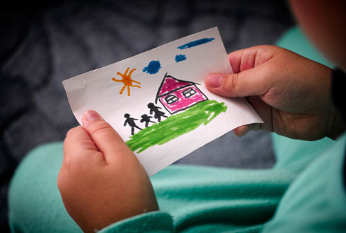 drawing of house and family