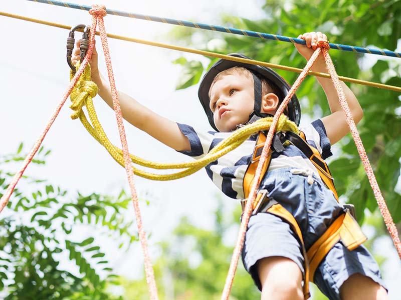 A child in an adventure park