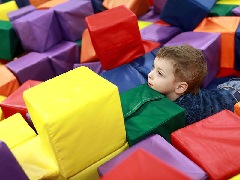 Young boy in soft play
