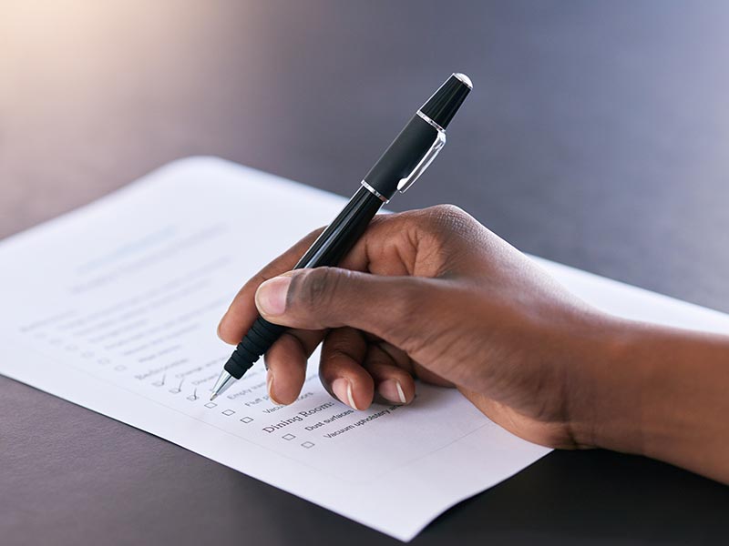 Someone completing a to-do list