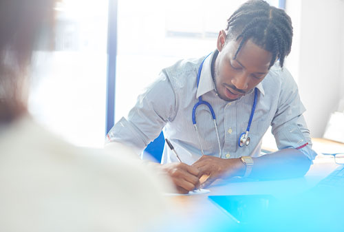 Doctor writing