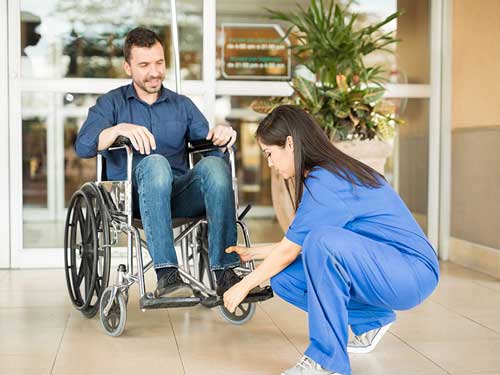 Nurse helping patient