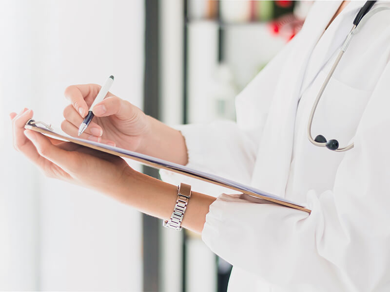 Doctor with medical report