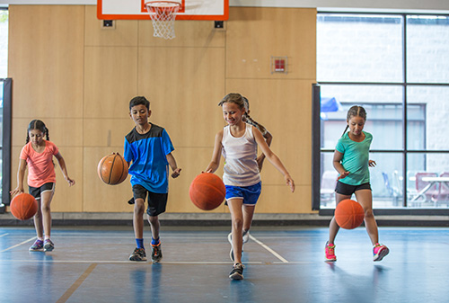 Children playing basketball