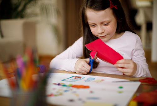Girl cutting paper