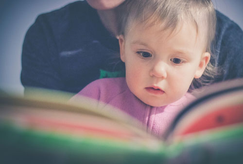 Child and parent reading