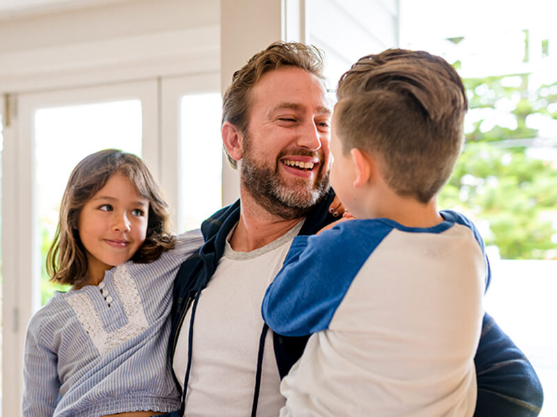 A happy father and his children